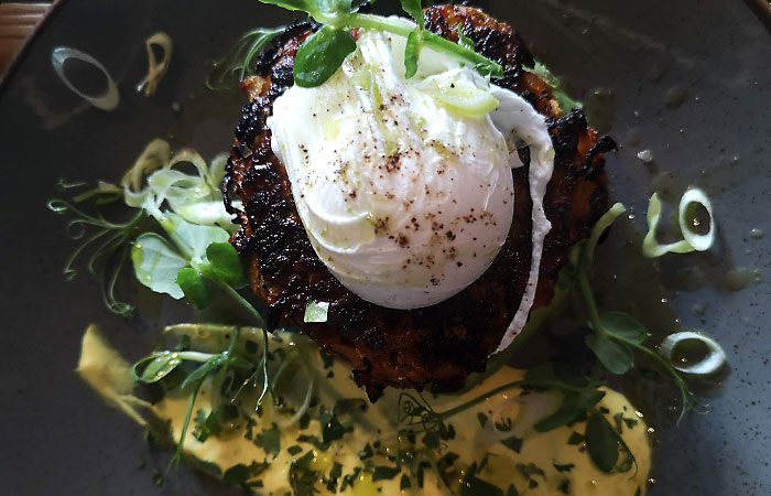 Poached egg, with courgette and sweet potato cakes